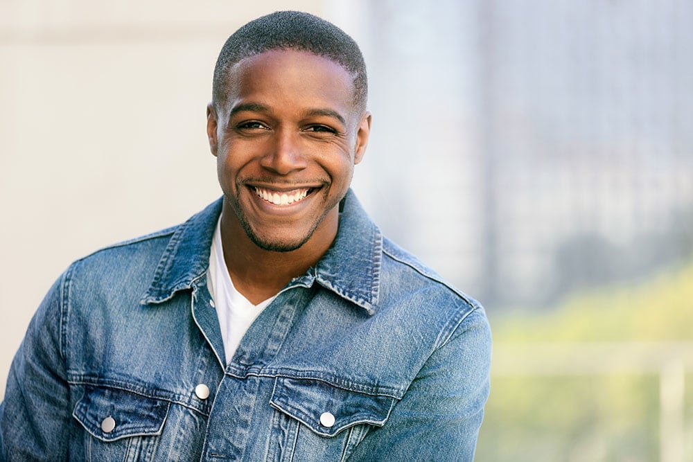 A man smiling at the camera